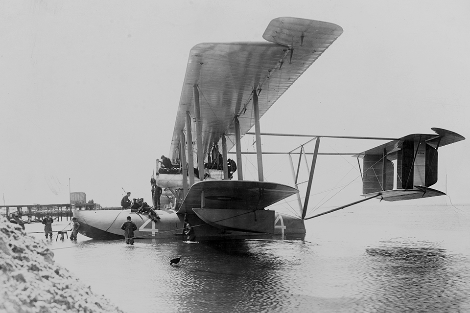 NC-4 undergoes maintenance at its mooring at Rockaway Naval Air Station on Long Island, N.Y., where all three Nancies started out on their Atlantic crossing. (Naval History and Heritage Command)