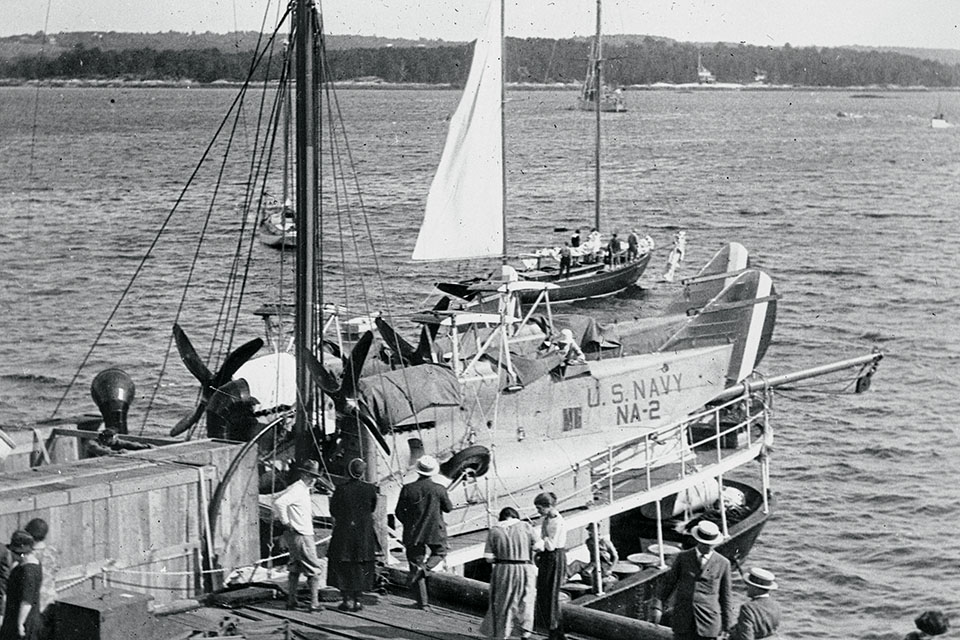Members of the MacMillan Arctic Expedition lash down two of the expedition’s Loening OL-2s aboard the SS Peary ready for the trip to Etah, Greenland. (Bettmann/Getty Images)