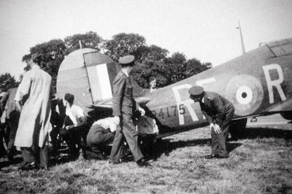 The Polish pilots quickly showed their determination to down Luftwaffe bombers at all cost. Here, Members of No 303 Squadron inspect damage to a Hurricane flown by Sgt. Josef František. The Czech pilot had ignored an Me 109 on his tail, to which he replied, "But he could not fire at me. I was too close on the tail of a bomber." (HistoryNet Archives)