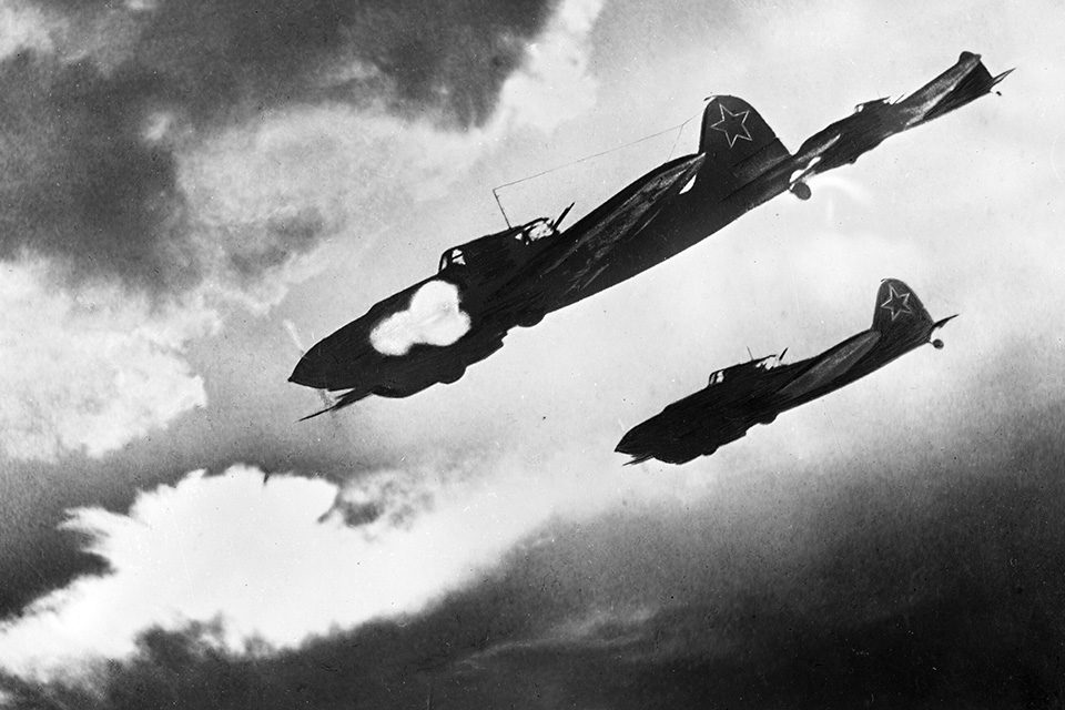 Guns blazing, Soviet Il-2 Sturomoviks attack a German tank column. (AKG-Images/RIA Novosti)
