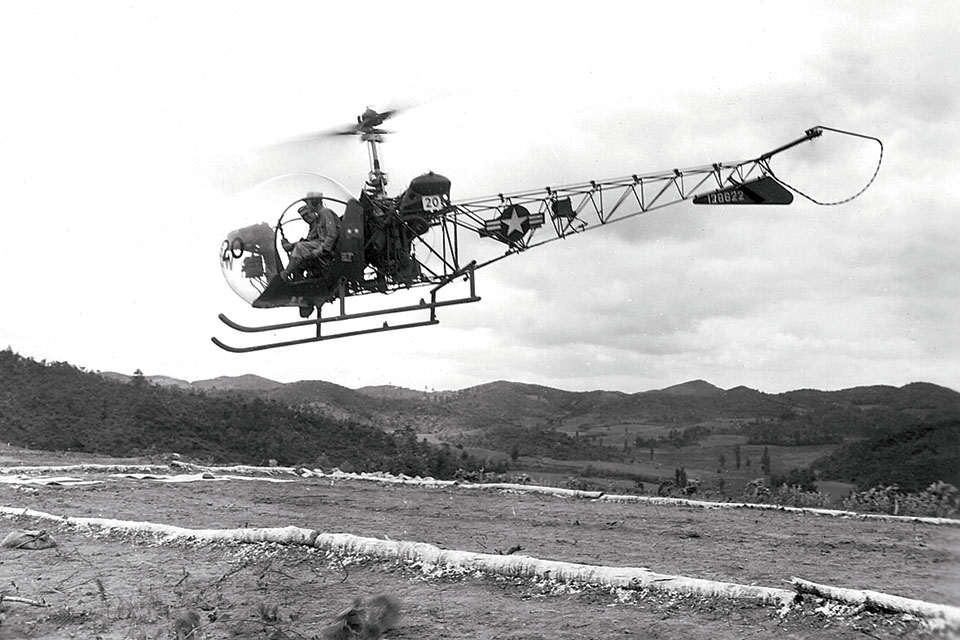 Major General John T. Selden, commander of the 1st Marine Division, sets out on an inspection tour aboard a Bell HTL-4 in May 1952. (National Archives)
