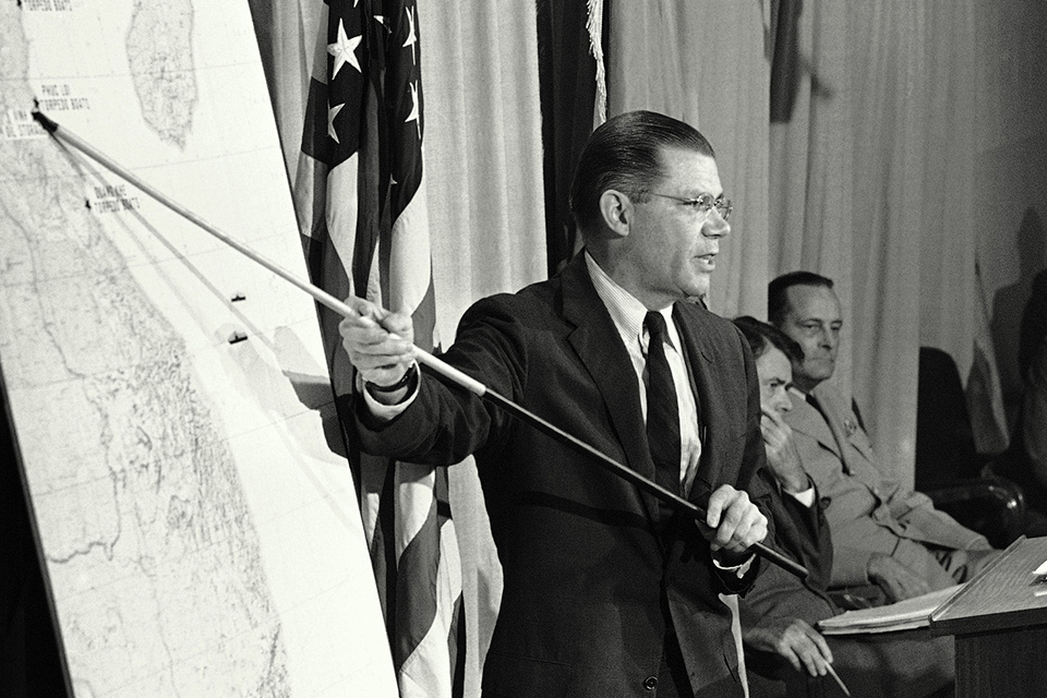 On Aug. 5, 1964, at a Pentagon news briefing, Sec. of Defense Robert McNamara indicates where aircraft struck back at North Vietnamese PT boats and their shore bases in retaliation for the two attacks on American ships in the Gulf of Tonkin. (AP Photo)