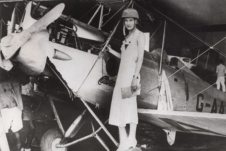 Jean poses with her Gypsy Moth in Kolkata, India, during one of her 35 refueling stops on the 1934 flight to Australia. (© adoc-photos/Corbis)