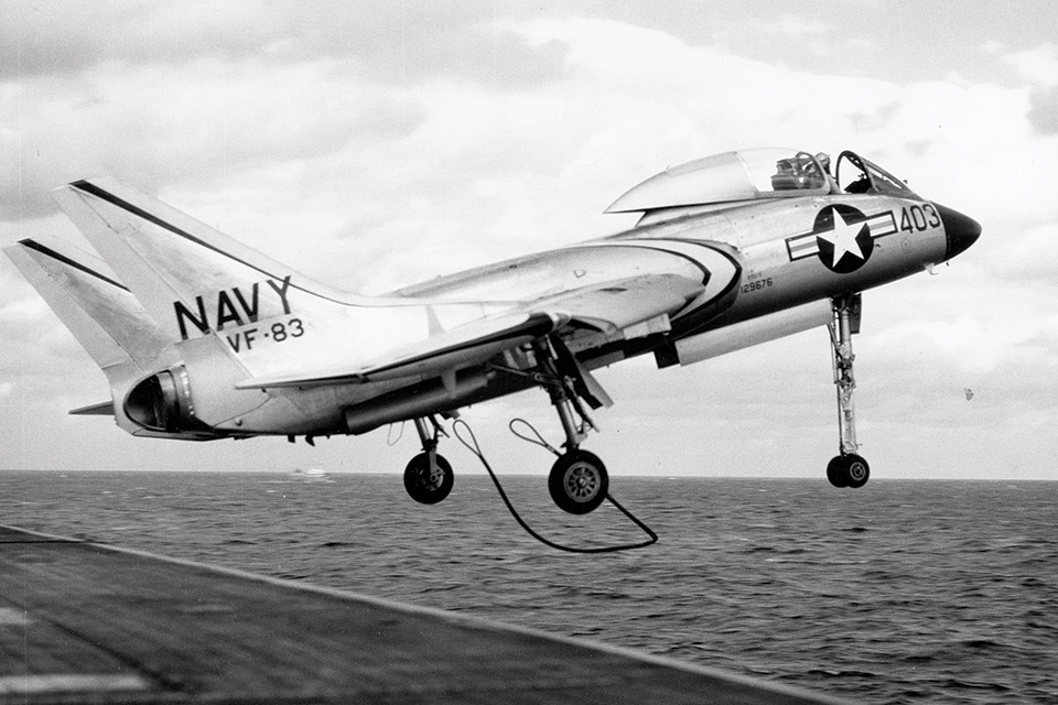 An F7U-3M takes off from Intrepid in 1954, leaving its bridle behind. (U.S. Navy)