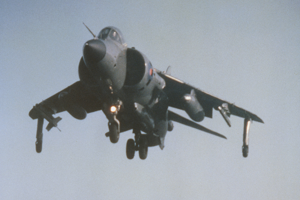 Lieutenant Commander Mike Blissett lands his Sea Harrier after downing an Argentine A4-B Skyhawk in 1982. (IWM KD2349)