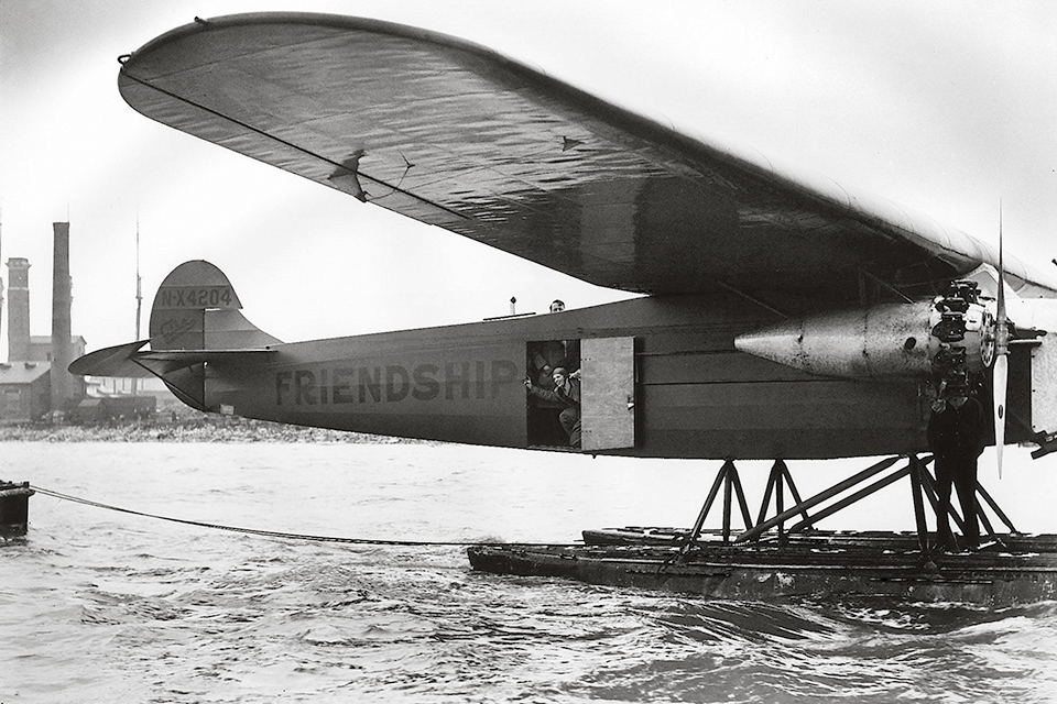 Earhart takes in Southampton from open door of the Fokker F7 “Friendship.” Crewed by Wilmer Stutz, Louis E. Gordon and Amelia, it was Stutz and Gordon who did most of the actual flying. (Mirrorpix/Alamy)