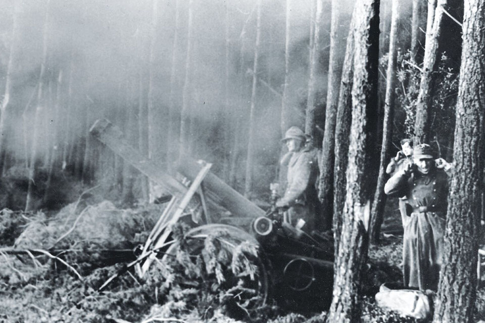 German defenders in the Hürtgen fielded more than 1,000 concealed guns, including this mortar firing on American positions near Düren. (General German Intelligence Service/Bundesarchiv)