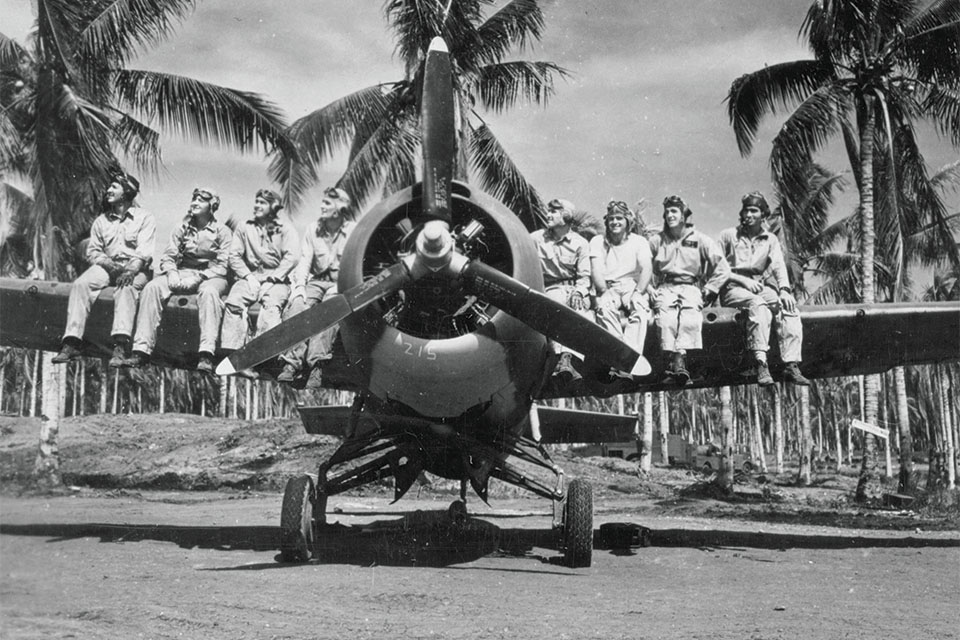 Foss (fourth from left) joins members of Marine Corps fighter squadron VMF-121 on a Wildcat wing at Henderson Field, Guadalcanal. (U.S. Marine Corps)