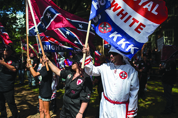 At Mr. Jefferson’s Village: White supremacist protesters demonstrate in Charlottesville, Virginia, against removal of the Lee statue (below) in that city.