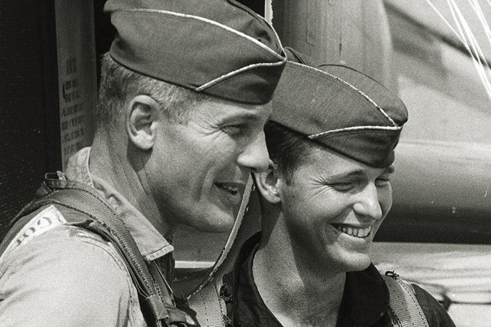 Capt. John Stone, right, with Olds, pitched the idea of “disguising” F-4s as F-105s to trick MiG pilots who were trying to avoid the F-4s. (U.S. Air Force)