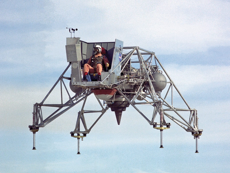 An astronaut trains for a prospective moon landing in a Lunar Landing Research Vehicle (LLRV) at the NASA Flight Research Center in 1967.