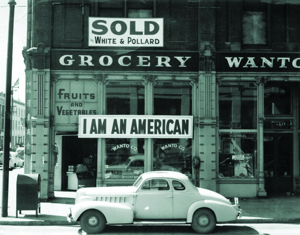  A Japanese American business owner in Oakland, California, tried to fend off anti-Japanese racism in the incendiary environment after Pearl Harbor. (Dorothea Lange/ Library of Congress)
