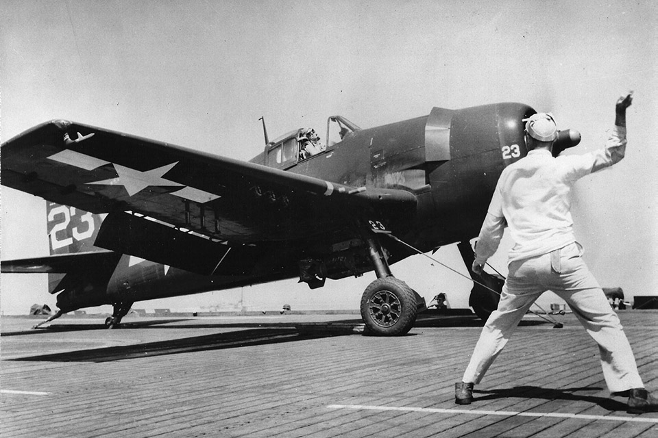An F6F-5 from VF-74 prepares to launch from USS Kassan Bay, bound for targets in southern France. (National Archives)