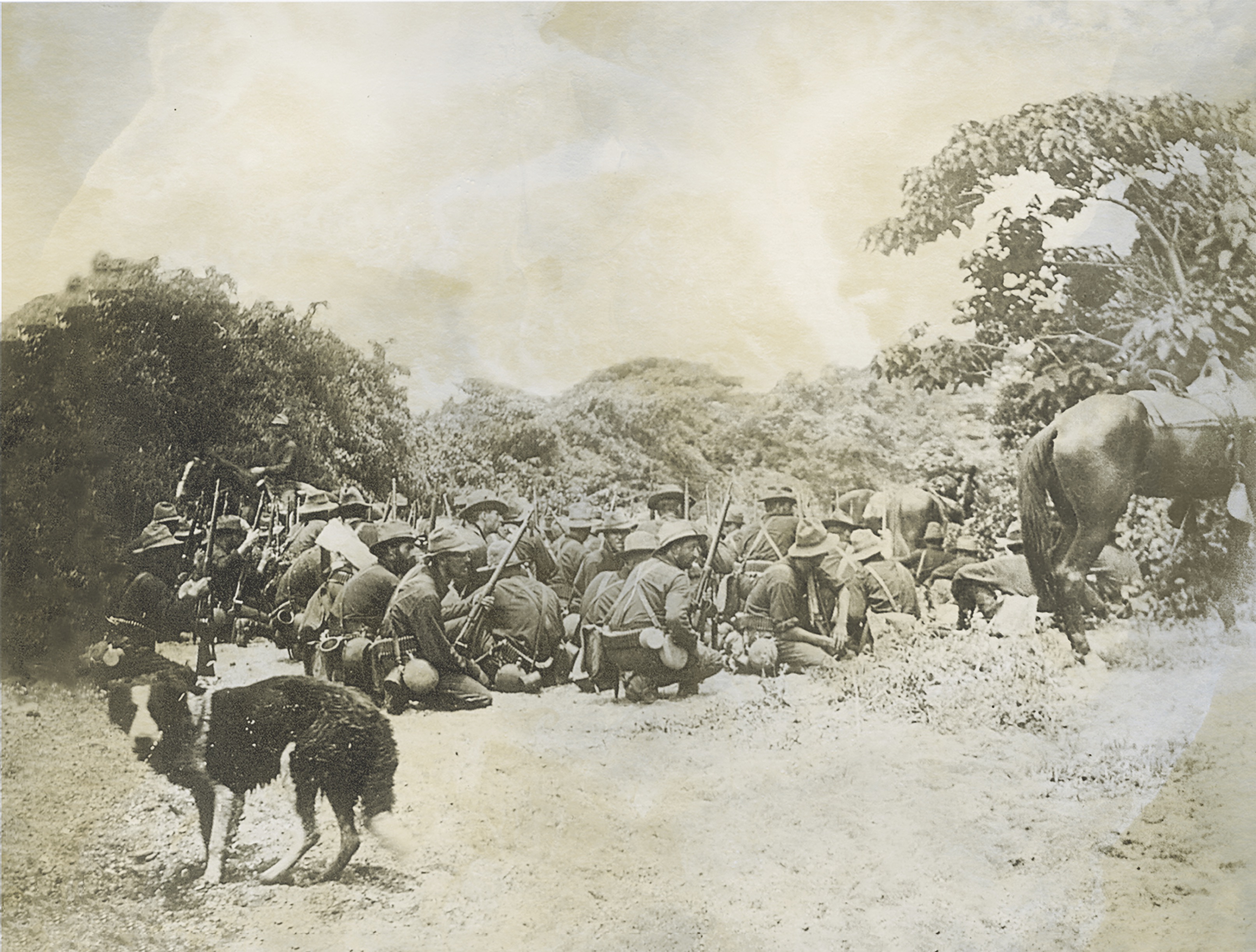 Soldiers in the 6th Infantry Regiment (above) kneel to avoid enemy fire as they await orders to charge the hill. (Library of Congress)