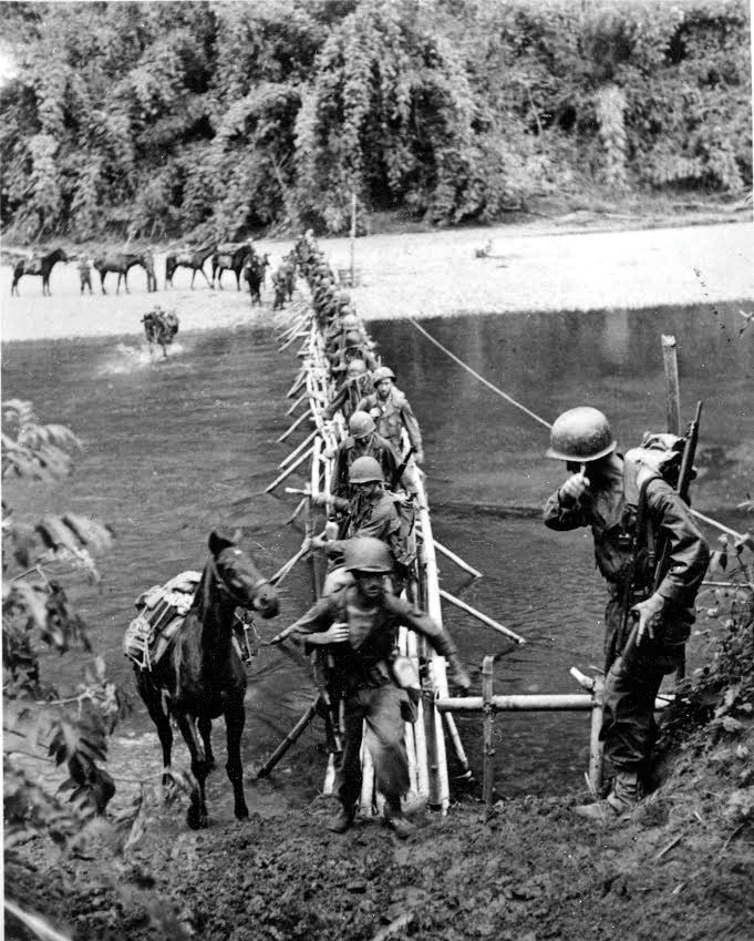 Soldiers traversing through the Burmese jungle, 1944. (U.S. Army)