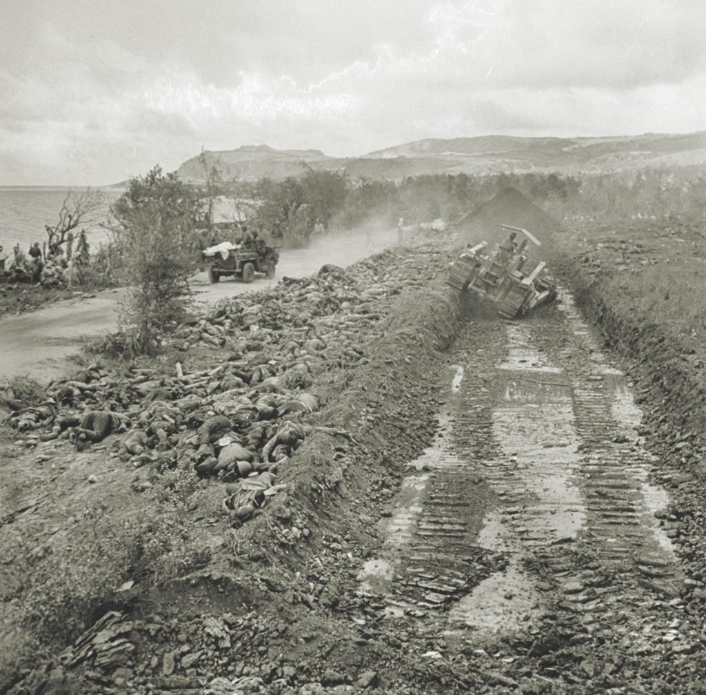 The toll from the July 7 attack was a staggering 4,311 enemy dead—most unceremonially buried in mass graves. (Eugene Smith/The LIFE Picture Collection via Getty Images)