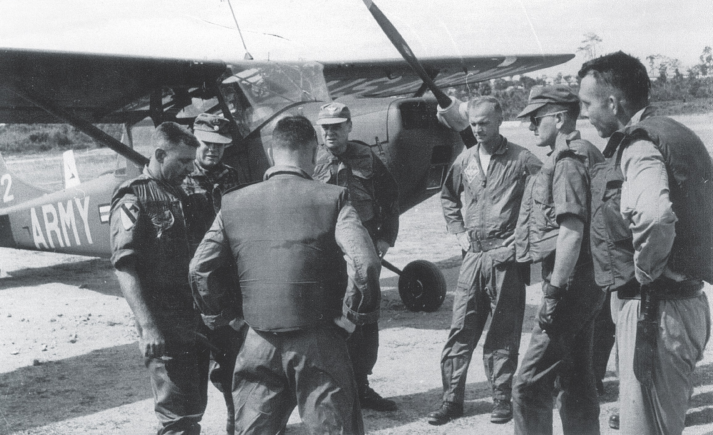 Capt. Thomas R. Messick, right, with his back closest to the camera during a group meeting on Dec. 11 / Courtesy photo