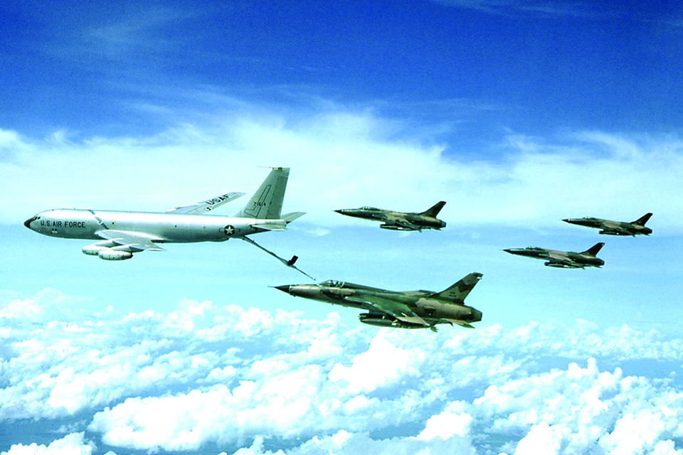 Bomb-laden F-105s refuel from a Boeing KC-135 tanker before heading to North Vietnam. In November 1965, Captain William Miller's Thunderchief was destroyed by a fuze-related premature bomb detonation as he approached a KC-130 to refuel.. (U.S. Air Force)