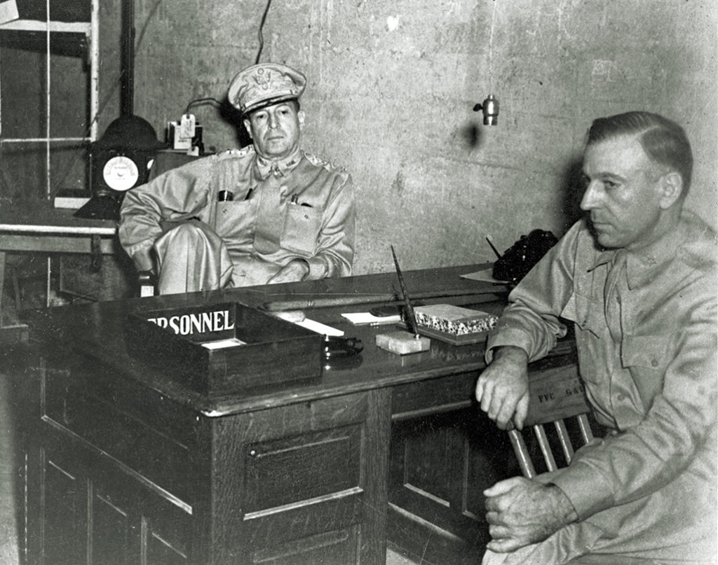 General Richard K. Sutherland (at right with MacArthur on Corregidor in March 1942) was a fierce gatekeeper for his boss. Below: the lavish Manila Hotel, where MacArthur occupied a penthouse suite, courtesy of President Quezon. (US Army/The LIFE Picture Collection via Getty Images) 