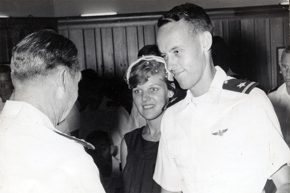 Manningham receives congratulations after his wife Fran pinned on his “wings of gold.” (Courtesy of Dan Manningham)