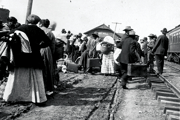 On that bittersweet day in April 1913 recently released Chiricahuas wait to board the westbound train to New Mexico. (Oklahoma Historical Society)