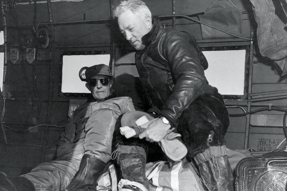 Expedition commanders Rear Admirals Richard H. Cruzen (left) and Richard E. Byrd board a Douglas R4D-5 during the operation. (U.S. Navy)