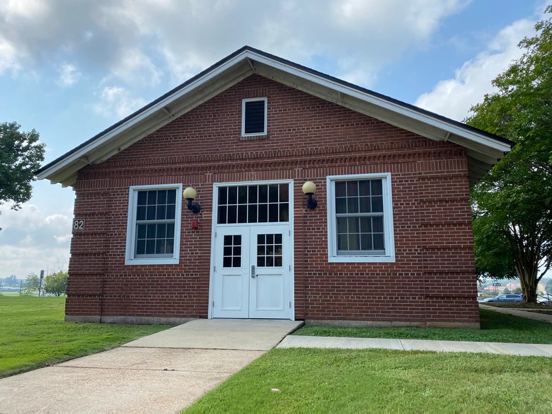 Seen here Aug. 3, 2021, Wigle Hall on Fort Benning is the building once used as the post exchange for the segregated 24th Infantry Regiment during World War II. Pvt. Felix Hall disappeared and was lynched on Feb. 12, 1941 while attempting to walk here. (Staff/Davis Winkie)