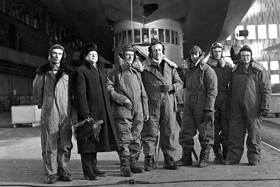 Crew and astronomers pose prior to boarding Los Angeles: (from left) Chester Watts, George Peters, Frank Littell, expedition leader Edwin Taylor Pollock, photographer Walter Richardson, U.S. Navy chief photographer Alvin Peterson and editor Watson Davis. (Smithsonian Institution Archives)