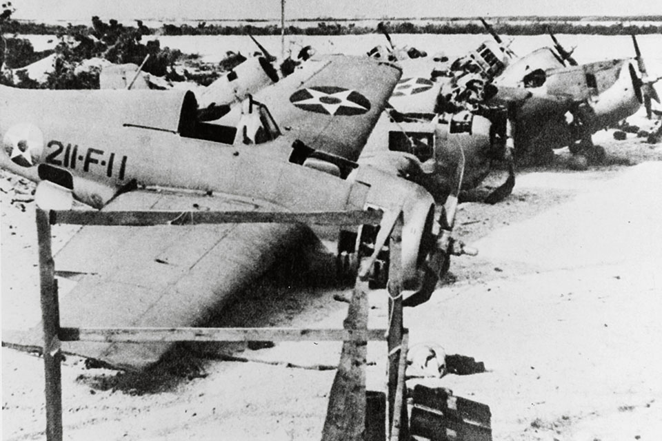 Having reinforced the island's defenses only days before, Marine Fighting Squadron 211 (VMF-211) used parts from damaged aircraft to keep their fighters flying until the final days of the battle. (USMC)