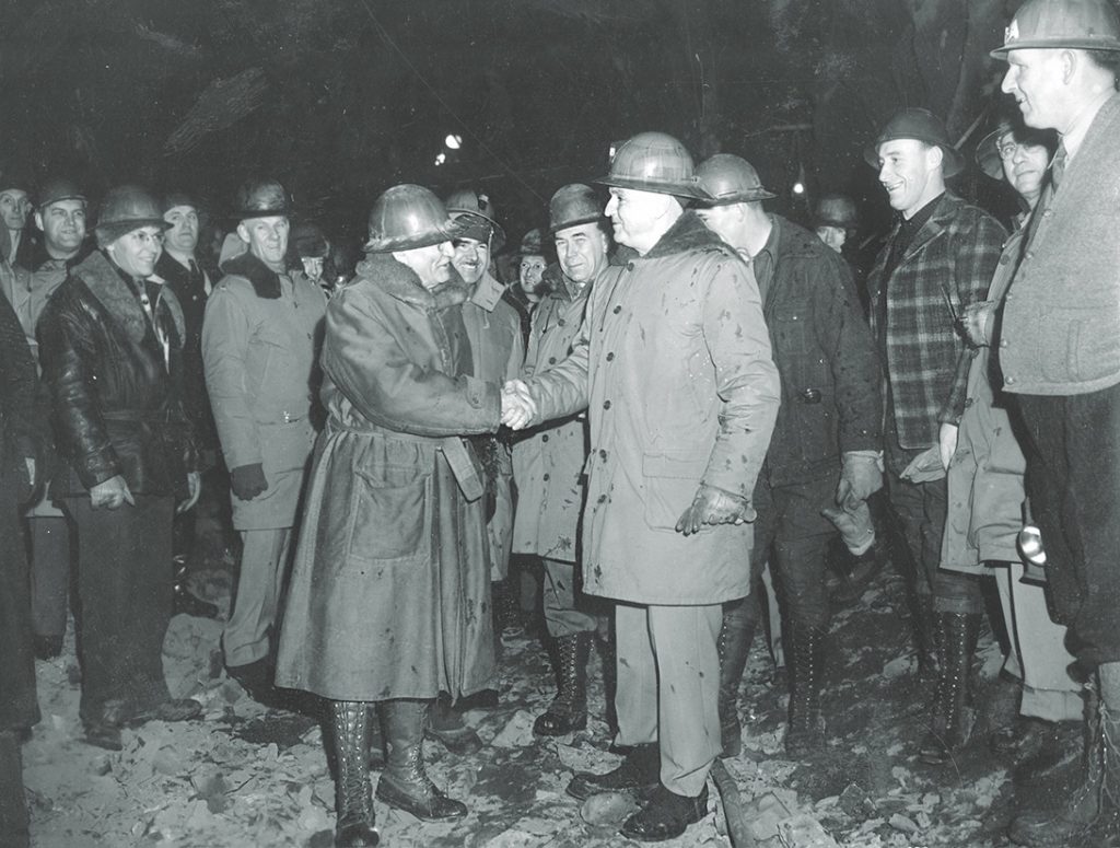 General Simon Bolivar Buckner Jr. (above, center right) oversaw the 1941–42 rail line construction that still carries trains today to Whittier. (B1979.2.1806, Alaska Railroad Collection, Atwood Resource Center, Anchorage Museum at Rasmuson Center, Anchorage, AK)