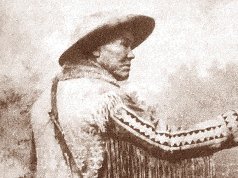 Frontiersman Tom Tobin poses with his Hawken rifle