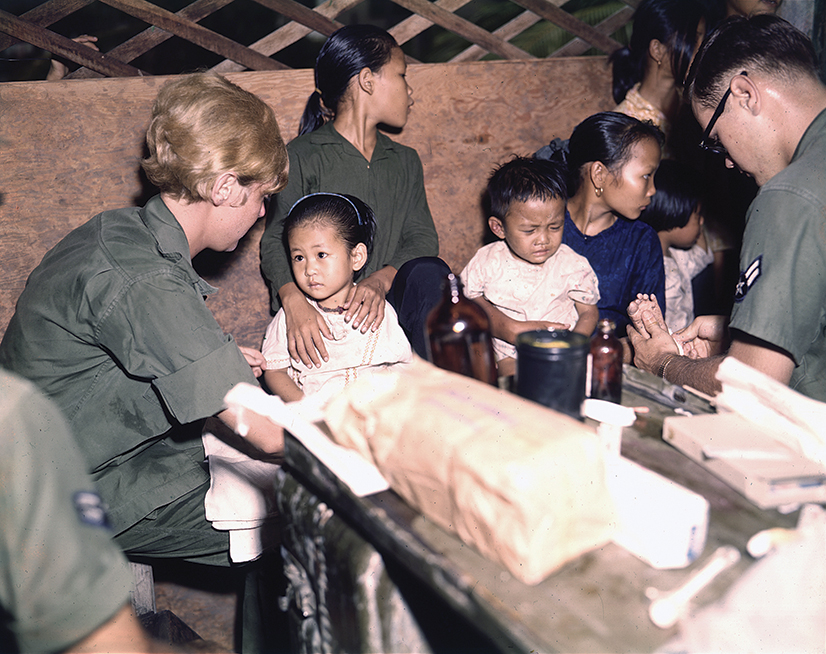 Second Lieutenant Kathleen M. Sullivan treats a Vietnamese child during Operation MED CAP, a U.S. Air Force civic action program in which a team of doctors, nurses, and aides travel to Vietnamese villages, treat the sick and teach villagers the basics of sanitation and cleanliness. Date  1967 Current location  National Archives and Records Administration, College Park Link back to Institution infobox template Still Picture Records Section, Special Media Archives Services Division (NWCS-S)