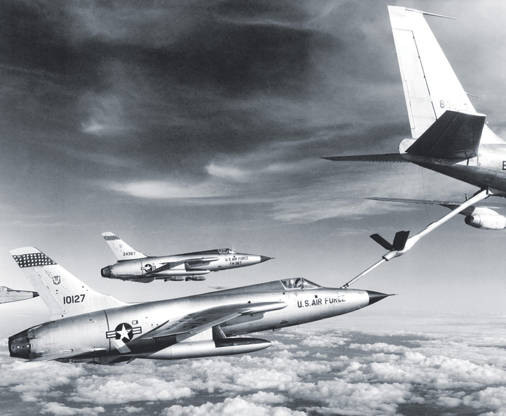 Three Air Force F-105 Thunderchief pilots enroute to bomb military target in Vietnam pull up to a flying Air Force "gas station." The refueling aircraft is an Air Force KC-135 Stratotanker. January 1966. (National Archives) U.S. Air Force Republic F-105D Thunderchief fighters refuel from a Boeing KC-135A Stratotanker en route to North Vietnam in 1966. The aircraft were from the 334th Tactical Fighter Squadron, deployed from the 4th Tactical Fighter Wing at Seymour Johnson AFB, North Carolina (USA) to Takli RTAFB.