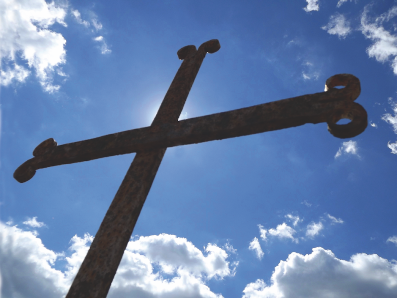 Traditional French cross decorating a grave in Old Mines, Missouri.