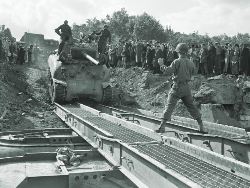 war-daddy-crosses-pontoon-bridge-in-belgium