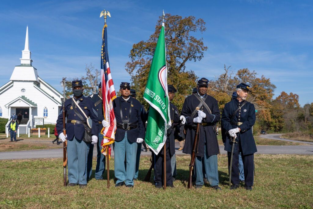 23rd USCT reenactors presenting colors