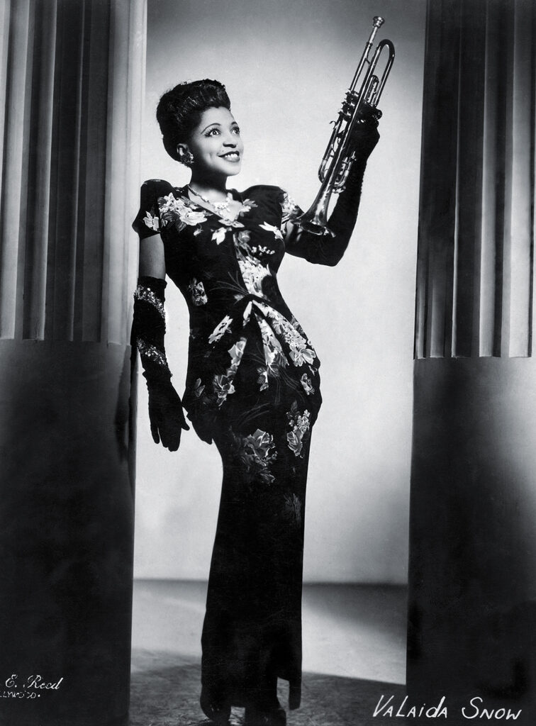 Photo of Valaida Snow with trumpet.