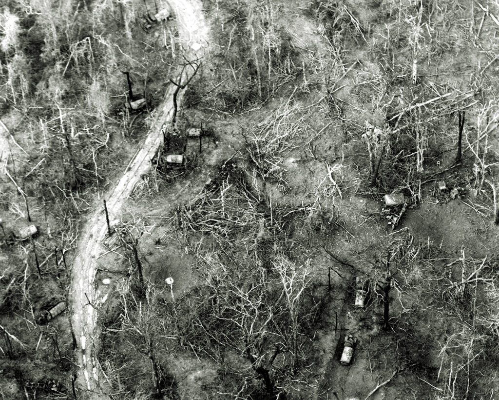 Photo of bombed-out enemy trucks speak to the gunships’ effectiveness. Both airships provided critical close air support; the AC-119K in particular gained a reputation as an excellent truck killer.