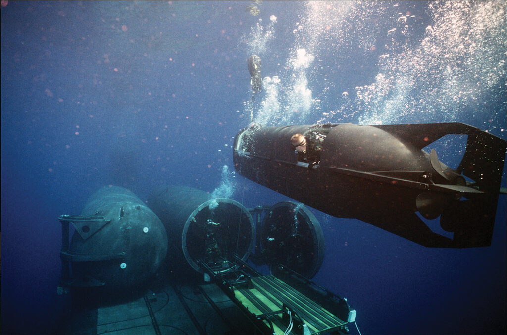 Photo of, the Mark VII SDVs’ shortcomings were addressed by the Mark VIII SEAL Delivery Vehicle, shown here, which was introduced in 1982.