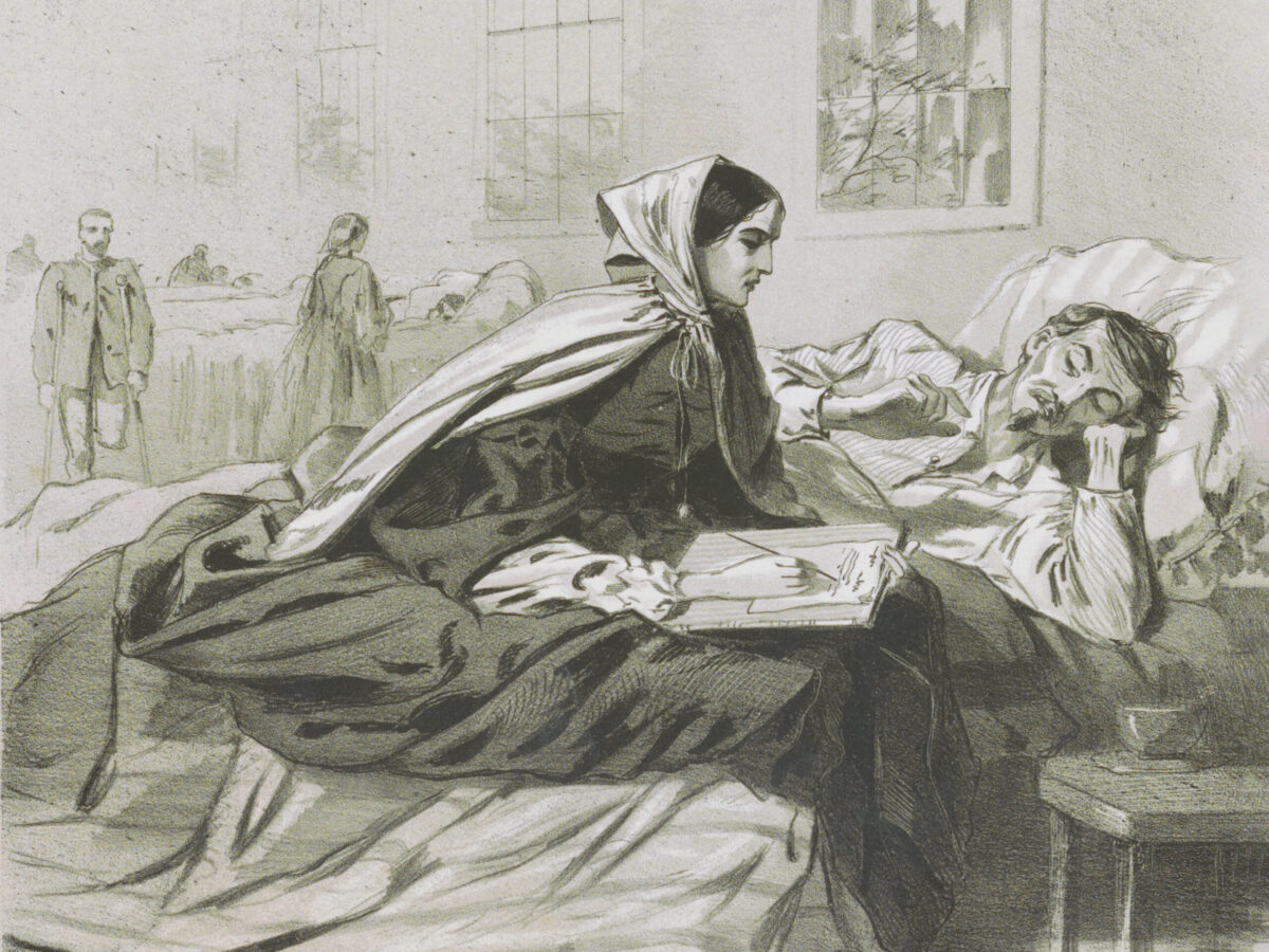 Nurse transcribing soldier's letter