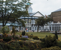 The glass houses of the Winter Garden, just behind the Opera House, are a year-round centerpiece of Buxton's 23-acre Pavillion Gardens.